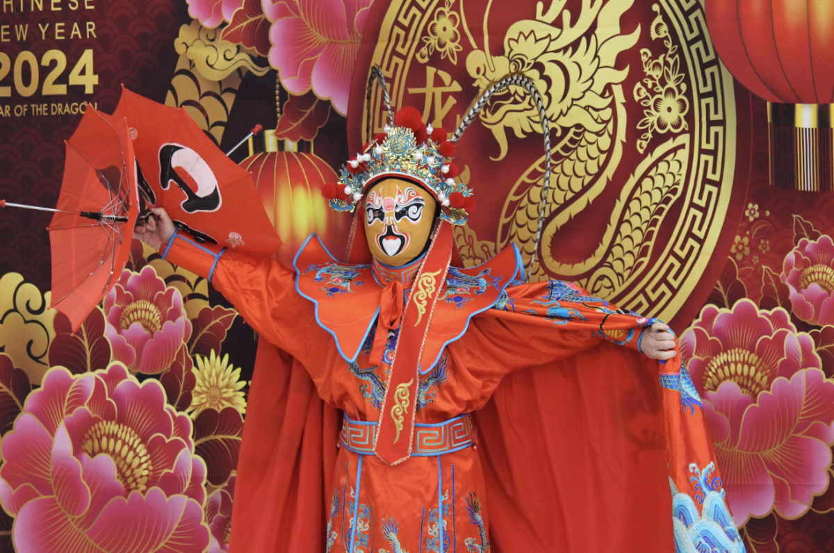 Traditional dancers from the Sunny Chinese Center captivate students through their performance of Bian Lian.